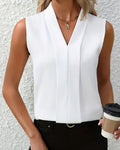 Nicole | Top relajado y elegante con escote en V refinado