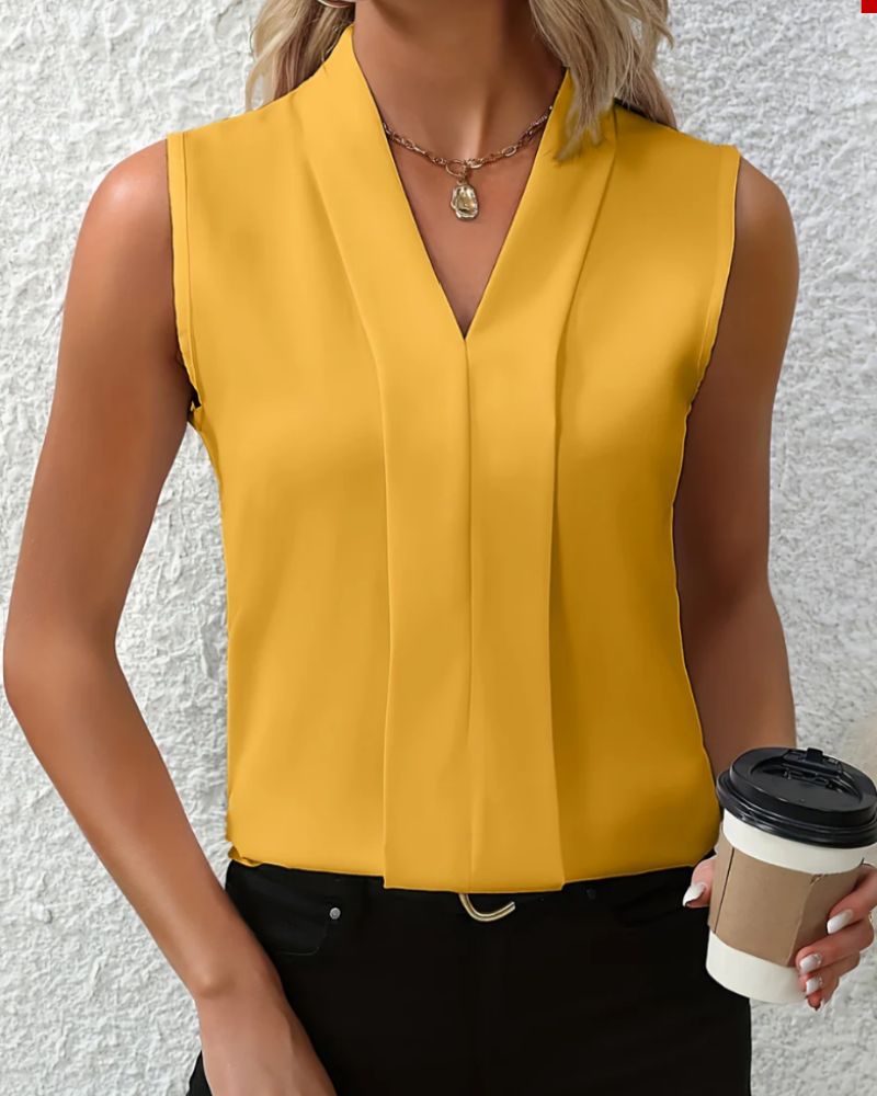 Nicole | Top relajado y elegante con escote en V refinado